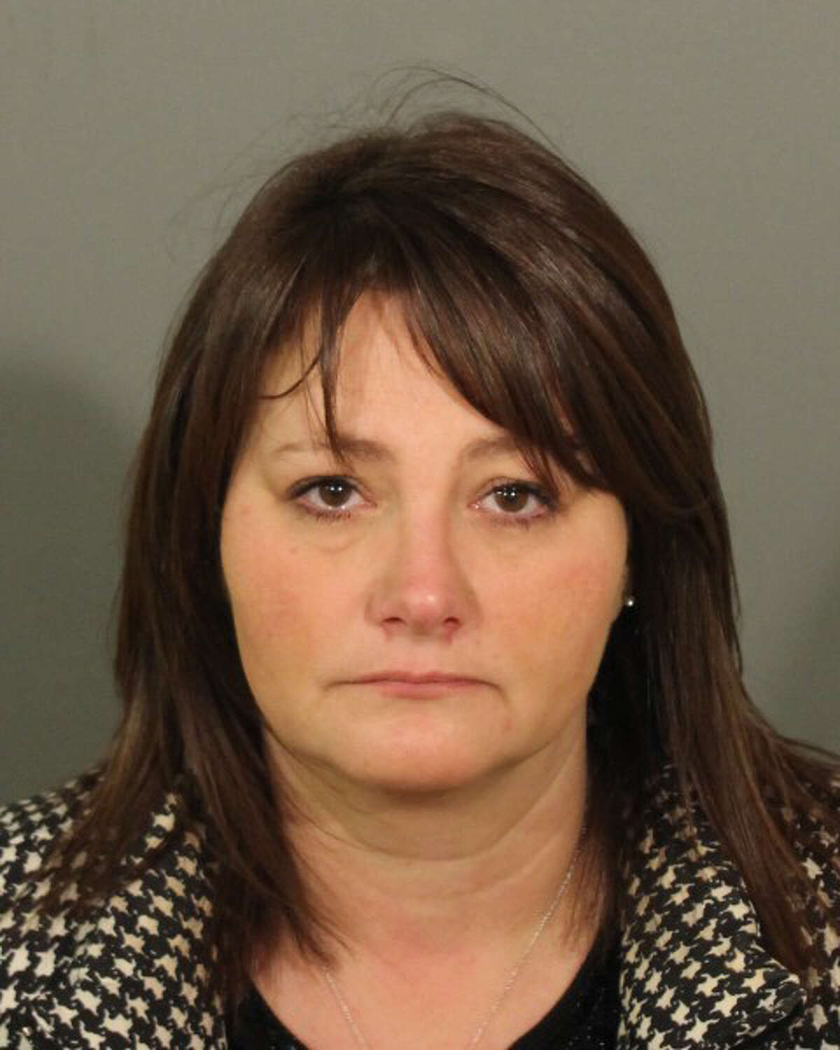 Traci Jones, 45, of Bethel, was charged Friday with third-degree assault, third-degree stalking, driving with intent to harass and breach of peace.