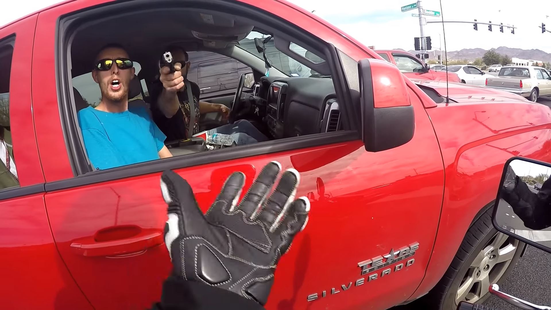 Texas man shown in road rage video pointing gun at Nevada motorcyclist ...