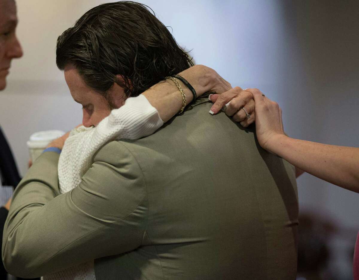 In the Bexar County 186th Criminal District Court, Ryan Bump hugs his mother, Lauri Payne Bump after Christian Bautista, is found guilty of murdering her daughter, Lauren Bump, Tuesday, Feb. 2, 2016. On December 31, 2013, Bump was running at O.P. Schnabel Park when Bautista stabbed her more than 20 times. Bautista is facing life in prison.
