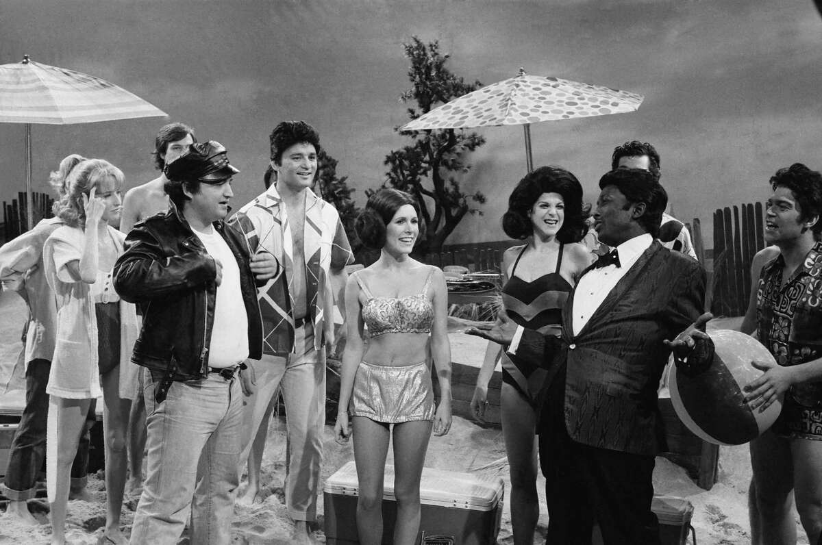 SATURDAY NIGHT LIVE -- Episode 6 -- Air Date 11/18/1978 -- Pictured: (l-r) John Belushi as Eric Von Zipper, Bill Murray as Frankie Avalon, Carrie Fisher as Princess Leia, Gilda Radner as Annette Funicello, Garrett morris as Chubby Checker during 'Beach Blanket Bimbo from Outer Space' skit on November 18, 1978