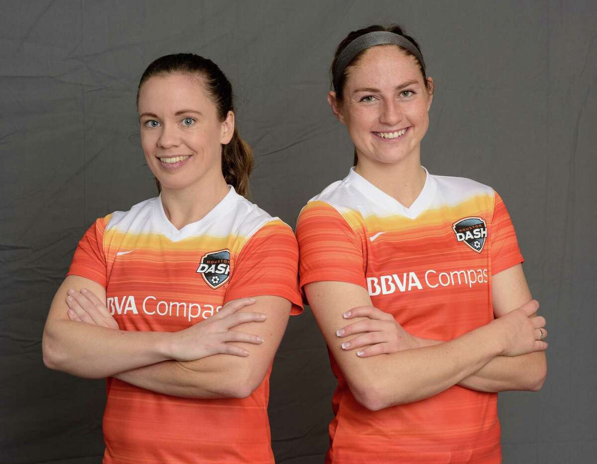 Dash defender Allysha Chapman (left) and rookie forward Janine Beckie moedel the team's new uniforms.