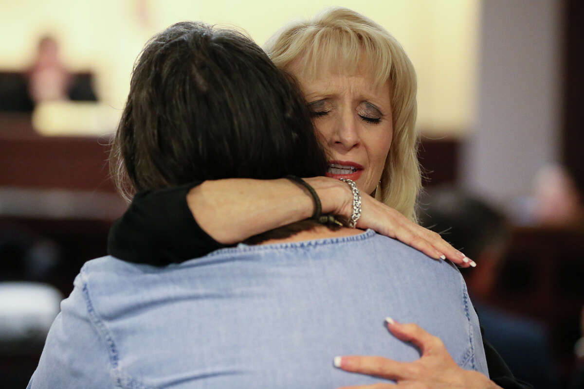 A supporter hugs Lauri Payne Bump, Lauren Bump’s mother, as court convenes during the punishment phase of the trial.