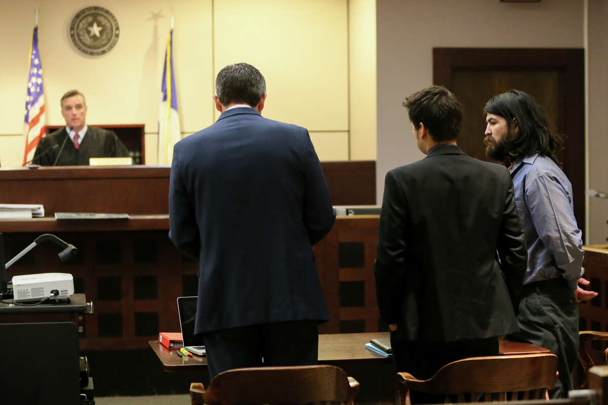 Christian Bautista (right) appears before Judge Jefferson Moore during the punishment portion of his trial in the Bexar County 186th Criminal District Court on Wednesday, Feb. 3, 2015 . Bautista, convicted of murder Tuesday in the brutal slaying of jogger Lauren Bump on New Year's Eve 2013, faces a maximum penalty of life in prision. MARVIN PFEIFFER/ mpfeiffer@express-news.net