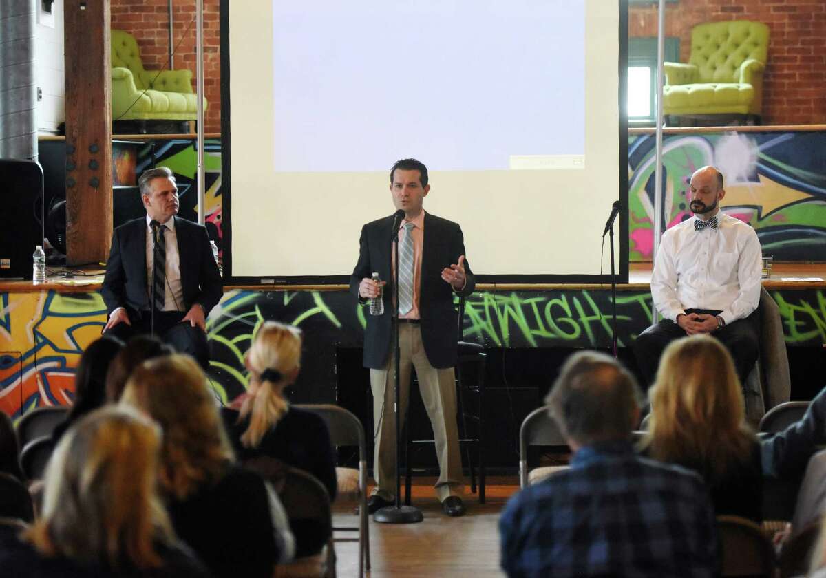 Greenwich Hospital Director of Addiction Medicine Jeremy Barosky, M.D., center, speaks beside Southfield Center Director of Behavioral Health Services Frank Batolomeo, Ph.D., left, and Greenwich High School certified school psychologist Dr. Jeffrey DeTeso, Ph.D., during the âÄúHow to Talk to Teens about Drinking and Drugs" discussion panel at the Arch Street Teen Center in Greenwich, Conn. Wednesday, Feb. 3, 2016. Dr. Frank Batolomeo, director of behavioral health services at the Southfield Center, Dr. Jeremy Barosky, director of addiction medicine at Greenwich Hospital, and Jeff DeTeso, certified school psychologist at Greenwich High School, gave insight on why some kids choose to participate in activities involving drugs and alcohol, how it can affect them and how to prevent it from happening.
