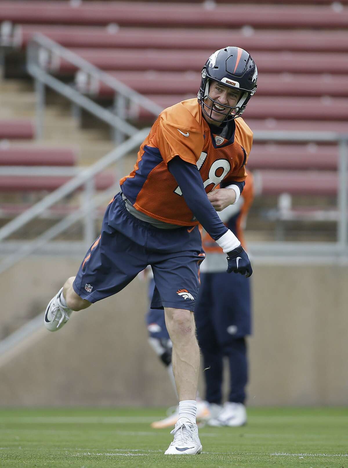Denver Broncos quarterback Peyton Manning (18) throws during an NFL football practice in Stanford, Calif., Wednesday, Feb. 3, 2016. (AP Photo/Jeff Chiu)