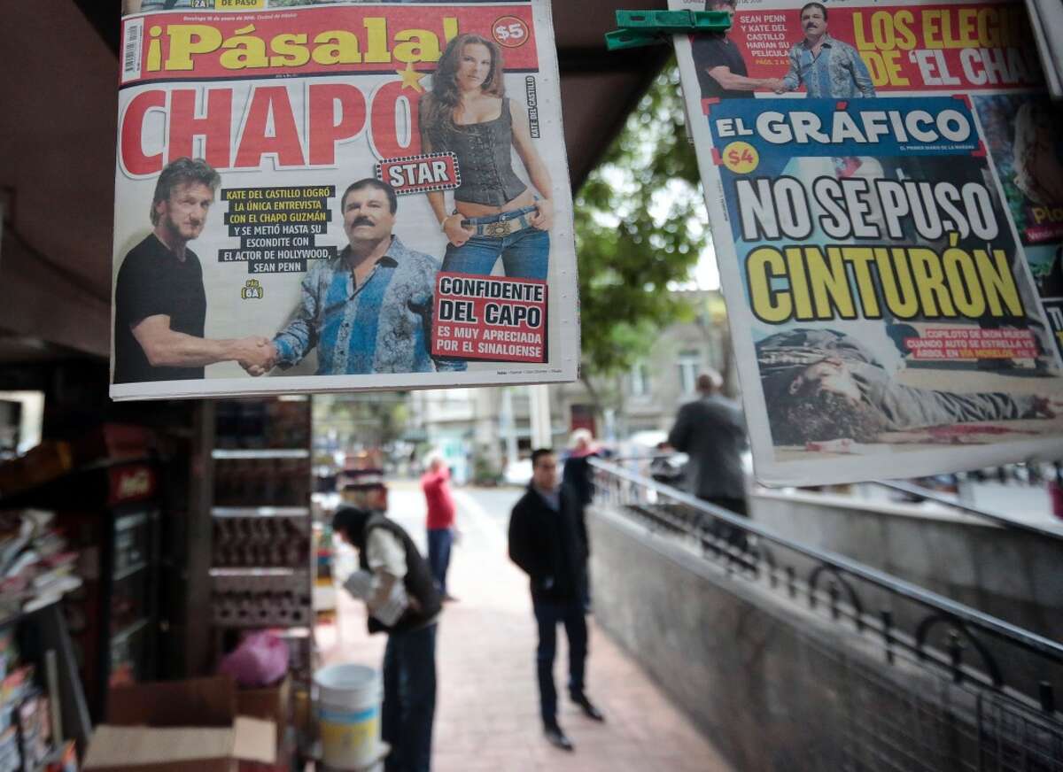 A newspaper shows a picture of drug lord Joaquin Guzman, aka "El Chapo", shaking hands with US actor Sean Penn (L), as seen at a newsstand in Mexico City, on January 10, 2016. Atress Kate del Castillo can be seen in the top right of the photo.