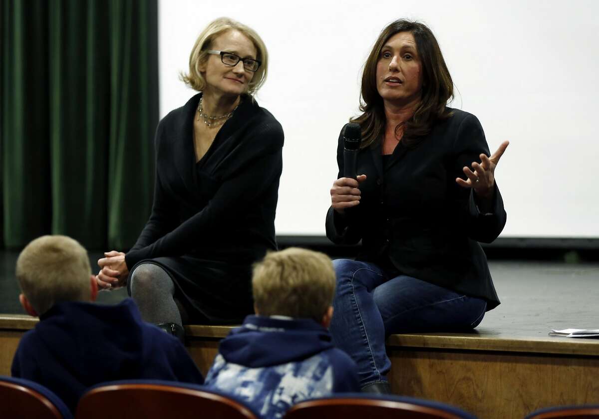 Producers Karin Gornick (left) and Lisa Tabb hold a Q&A session with the audience after a viewing their documentary "Screenagers" at Sir Francis Drake High School in San Anselmo, California, on Wednesday, Feb. 3, 2016.