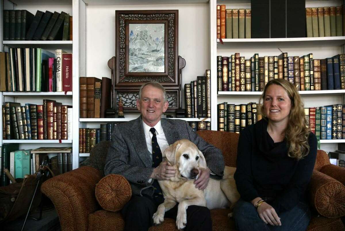 Rob Simmons, Republican candidate for the U.S. Senate, sits with his dog Bailey and his daughter Jane in the family home in Stonington, Conn.on Monday, March 8, 2010.