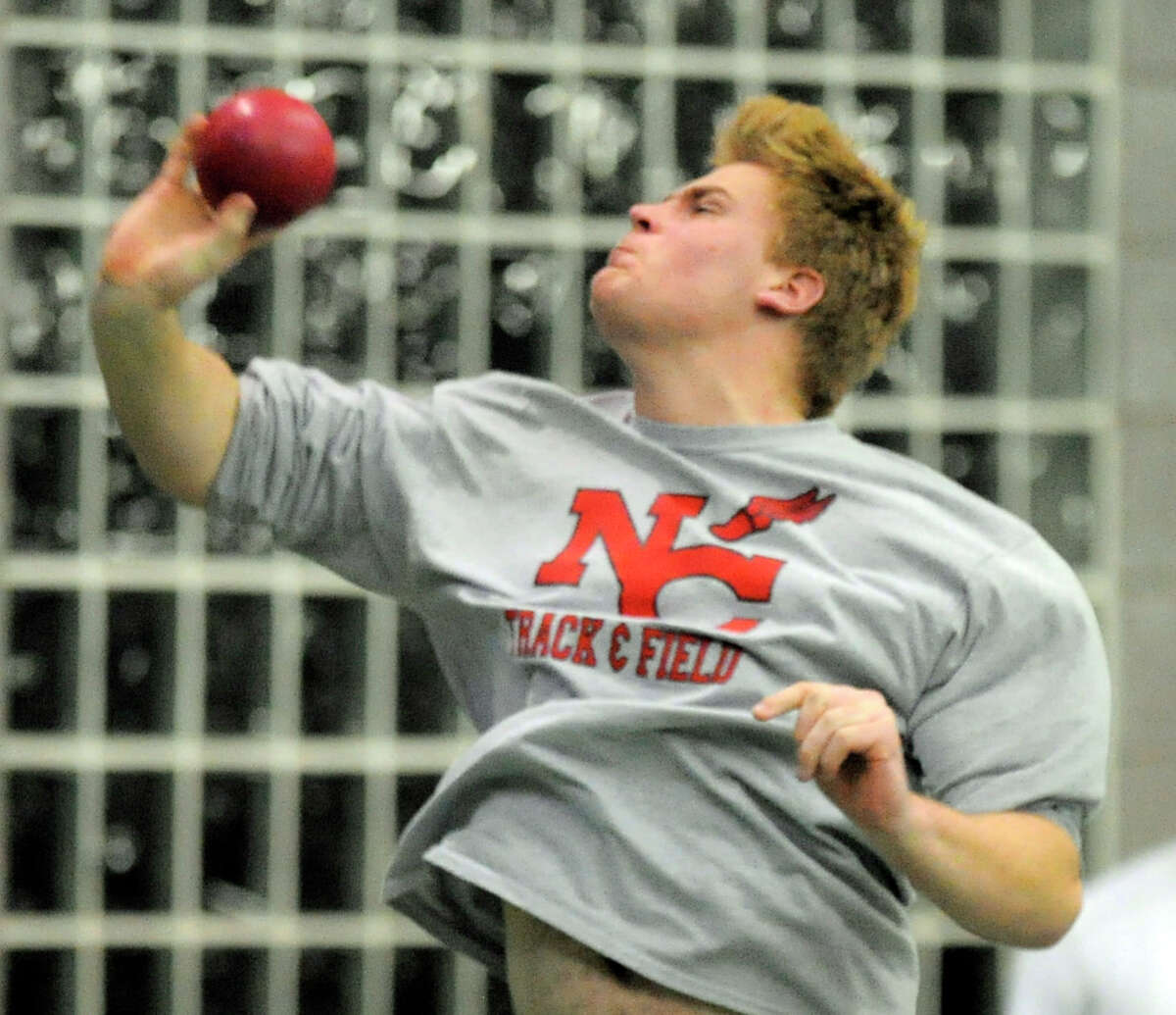 New Canaan's Will Conley competes in the boys shot put event during the FCIAC Boys and Girls Track Championships at the Floyd Little Athletic Center in New Haven, Conn. on Feb. 4, 2016.