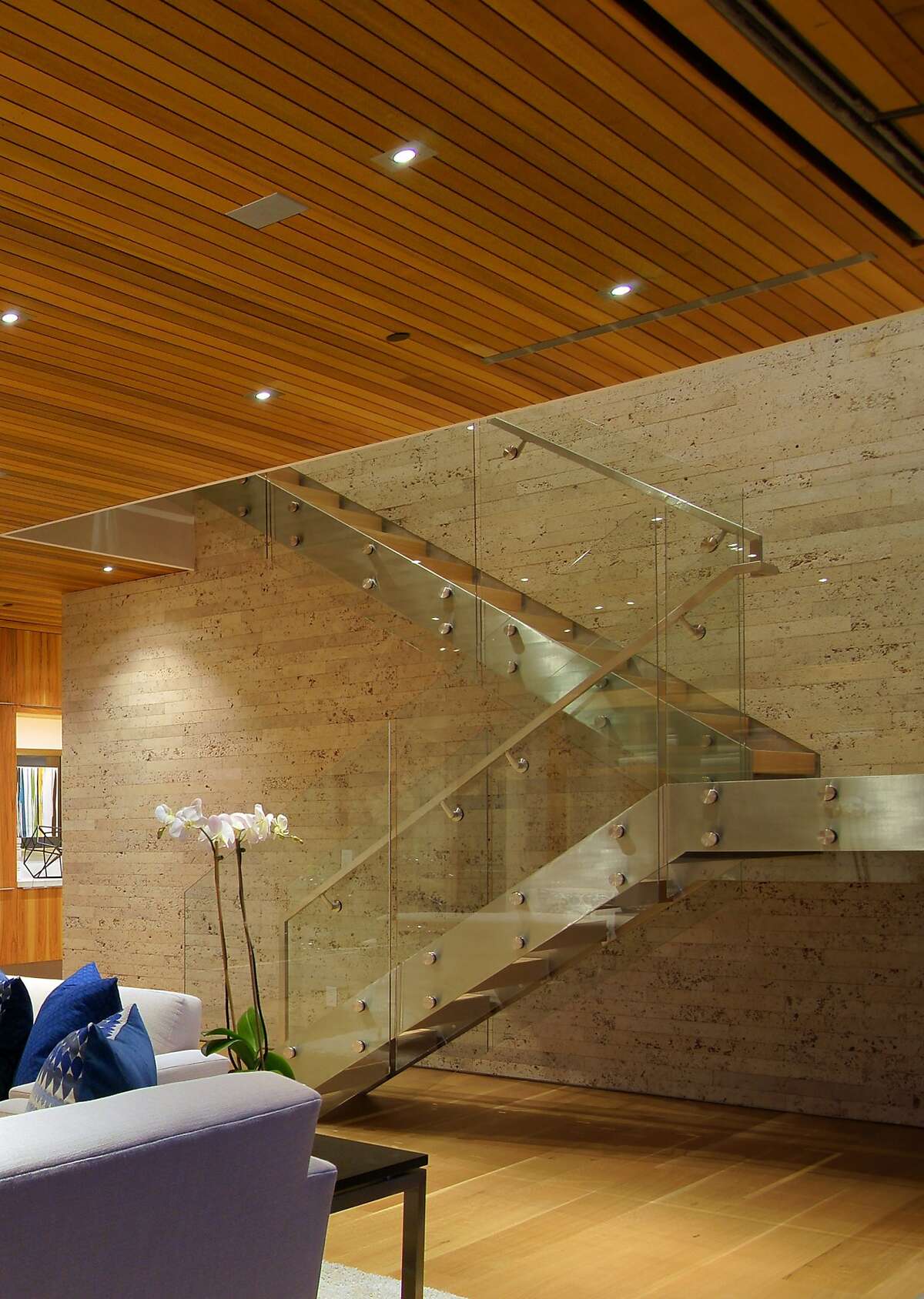 Retractable glass walls create exemplary indoor/outdoor living in Tiburon