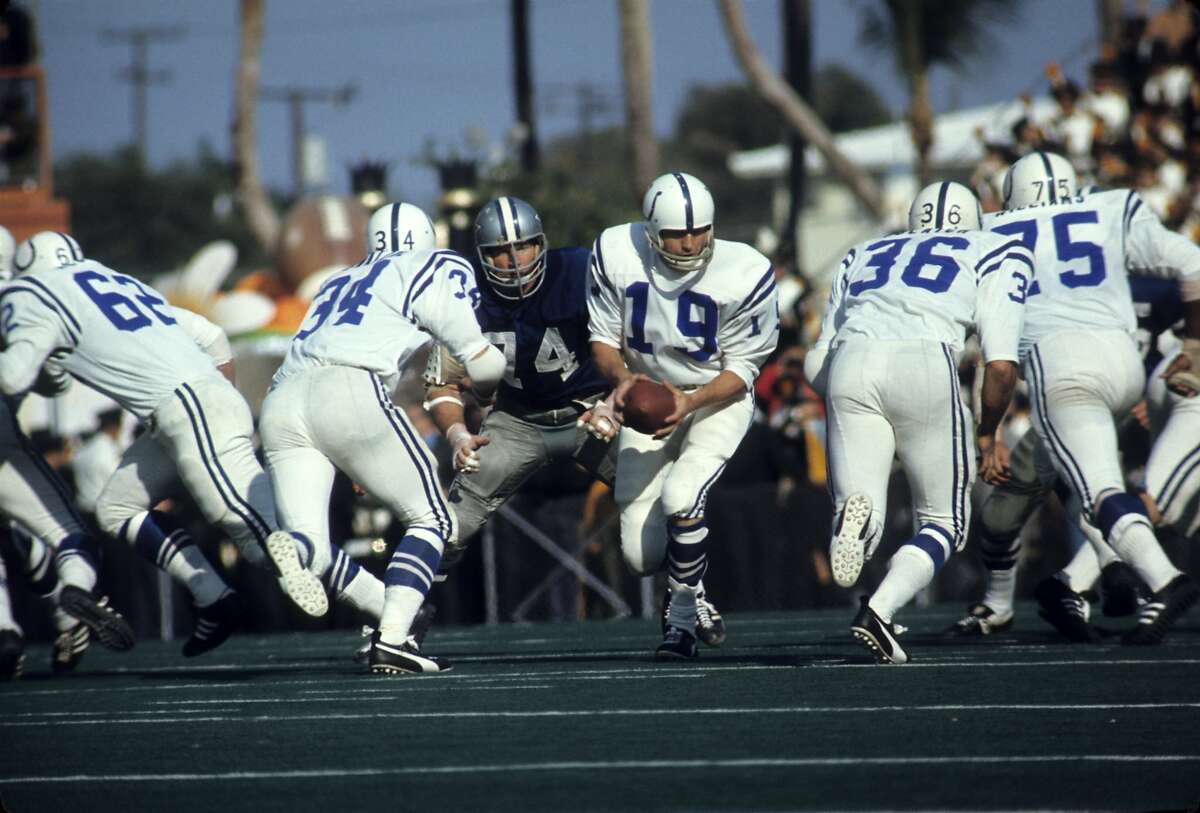 Life magazine photographers cover the first Super Bowl.