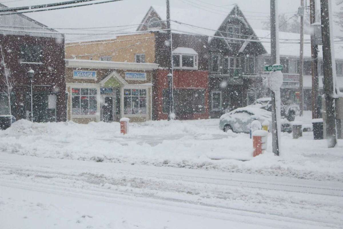 Snow fell steadily throughout the Milford area Friday morning.