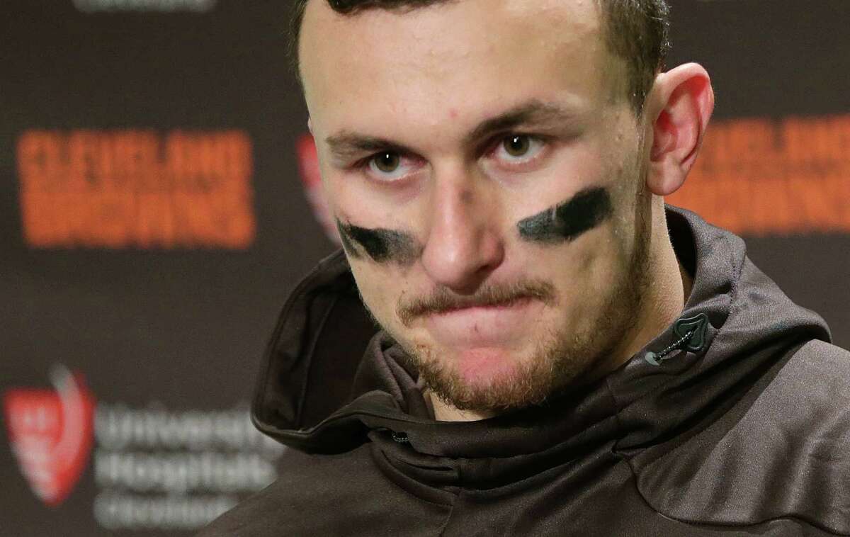 In this Sunday, Dec. 20, 2015, file photo, Cleveland Browns quarterback Johnny Manziel speaks with media members after an NFL football game against the Seattle Seahawks, in Seattle.