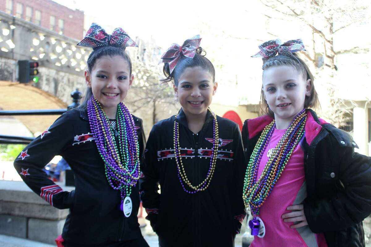 Always up for a party, San Antonio residents hit the River Walk for a little Mardi Gras fun Saturday afternoon.