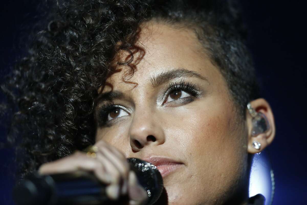 Alicia Keys greets the audience before her performance at Super Bowl City Feb. 6, 2016 in San Francisco, Calif.