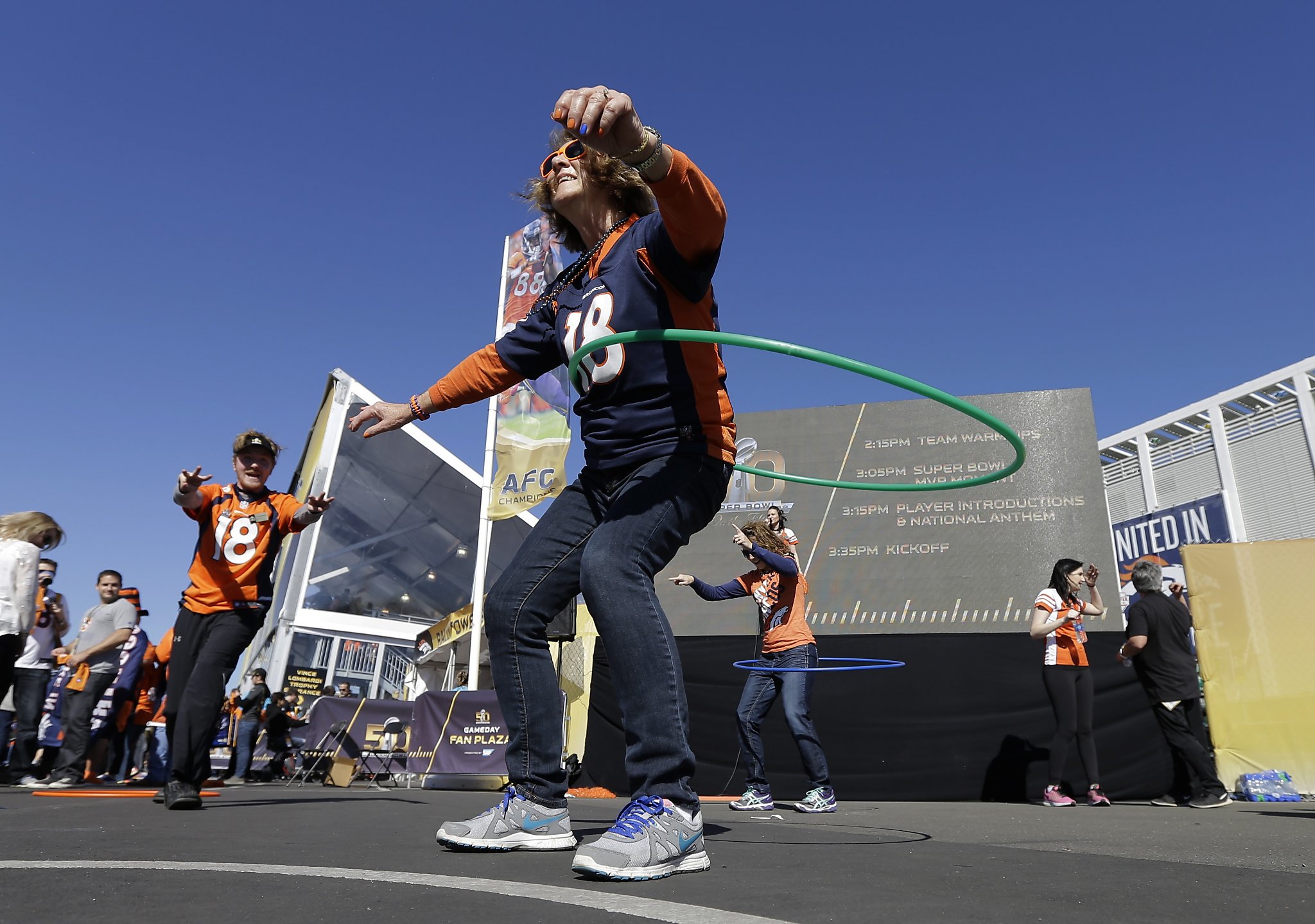 Stairway to shade: Super Bowl fans flee pregame heat