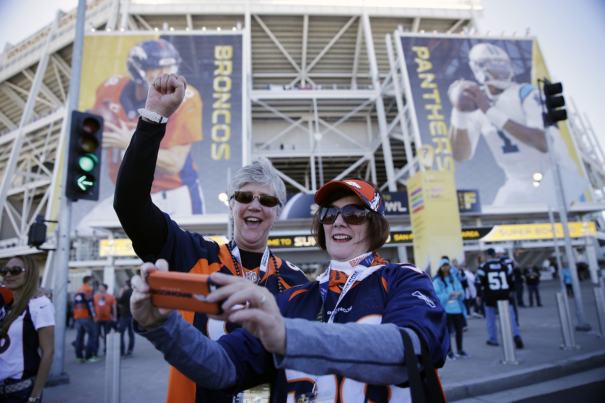 Stairway to shade: Super Bowl fans flee pregame heat