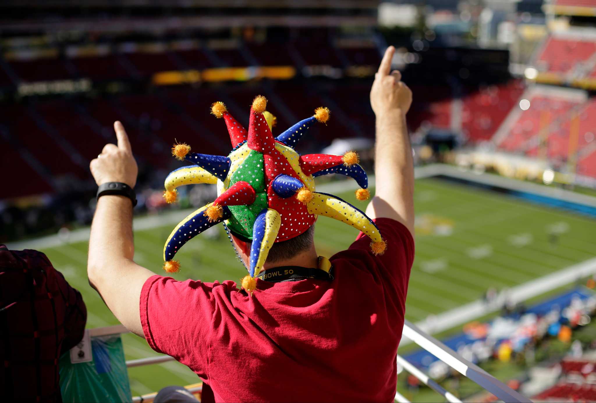 Stairway to shade: Super Bowl fans flee pregame heat