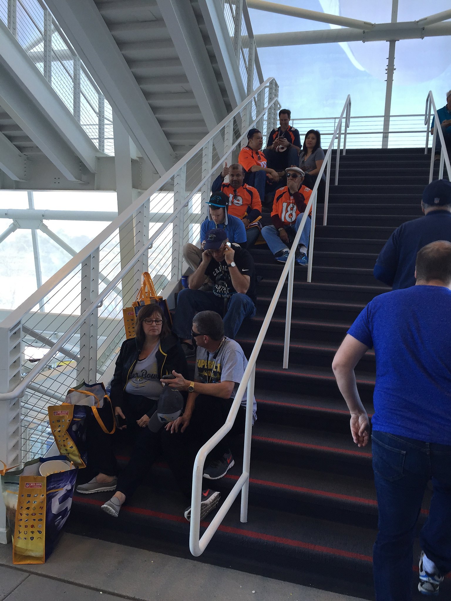 Stairway to shade: Super Bowl fans flee pregame heat