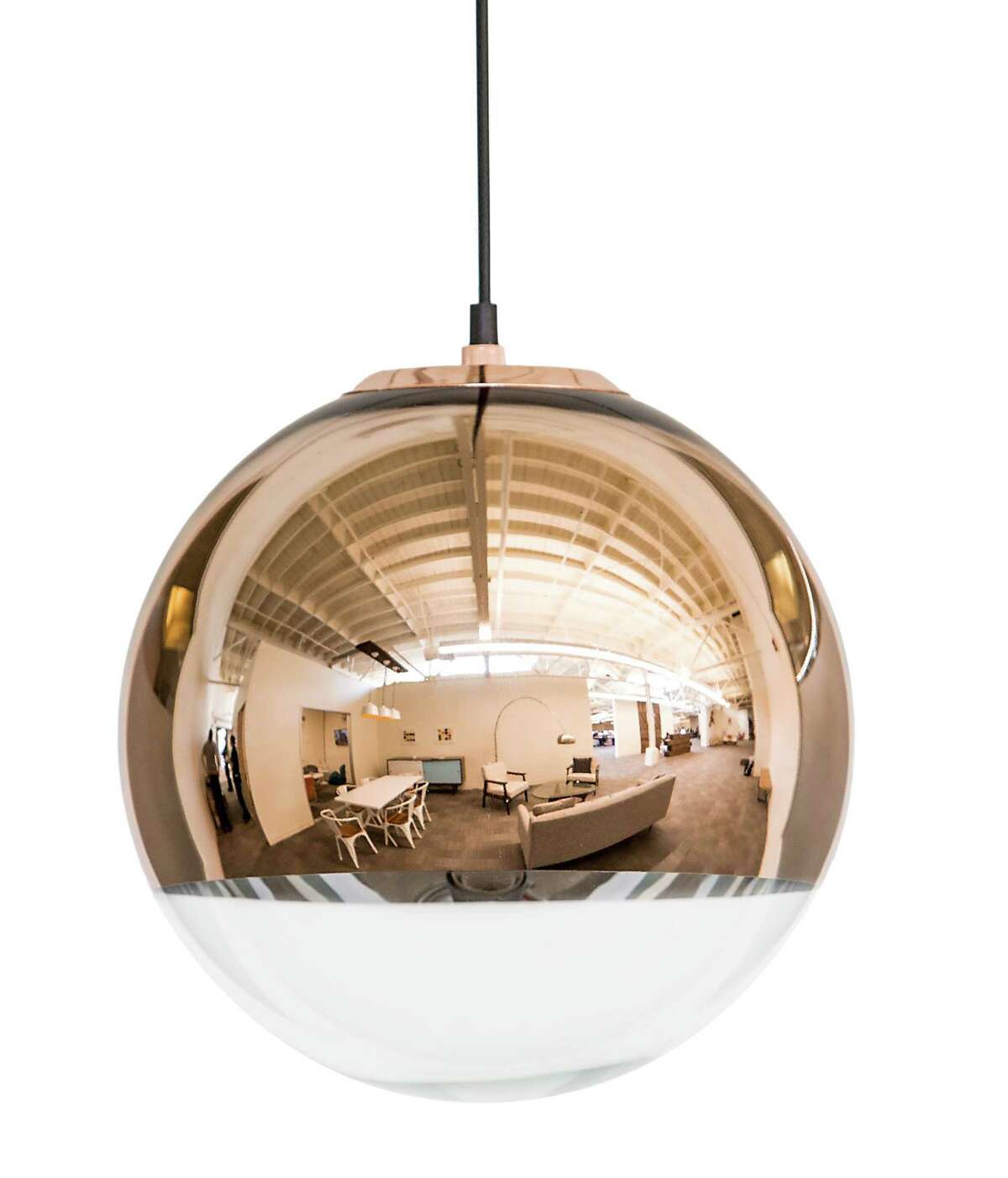 Dot & Bo's Sphere Pendant Lamp in copper ($378, dotandbo.com).