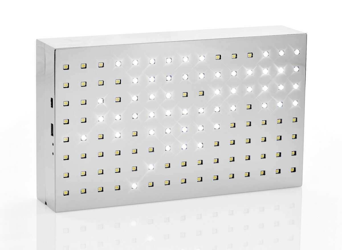 The SCINTILLATOR clutch, designed by fashion designer Lisa Perry and artist Leo Villareal, is a metal evening bag that is encoded and powered by LED lights to create a sequenced and illuminating display. The numbered limited edition 75-piece collection will retail at $2,995 at www.lisaperrystyle.com, and select Barneys New York stores.