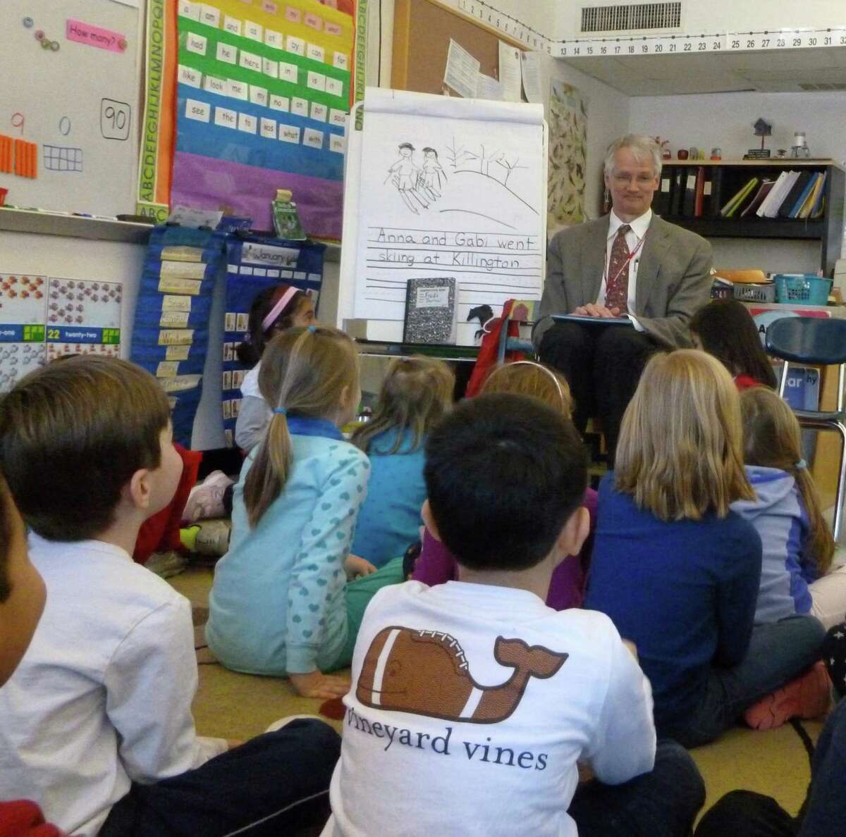Superintendent of Schools William McKersie read “The Napping House,” by Audrey Wood, to each of the International School at Dundee’s three kindergarten classes, during a visit for the school’s January Reading Challenge.