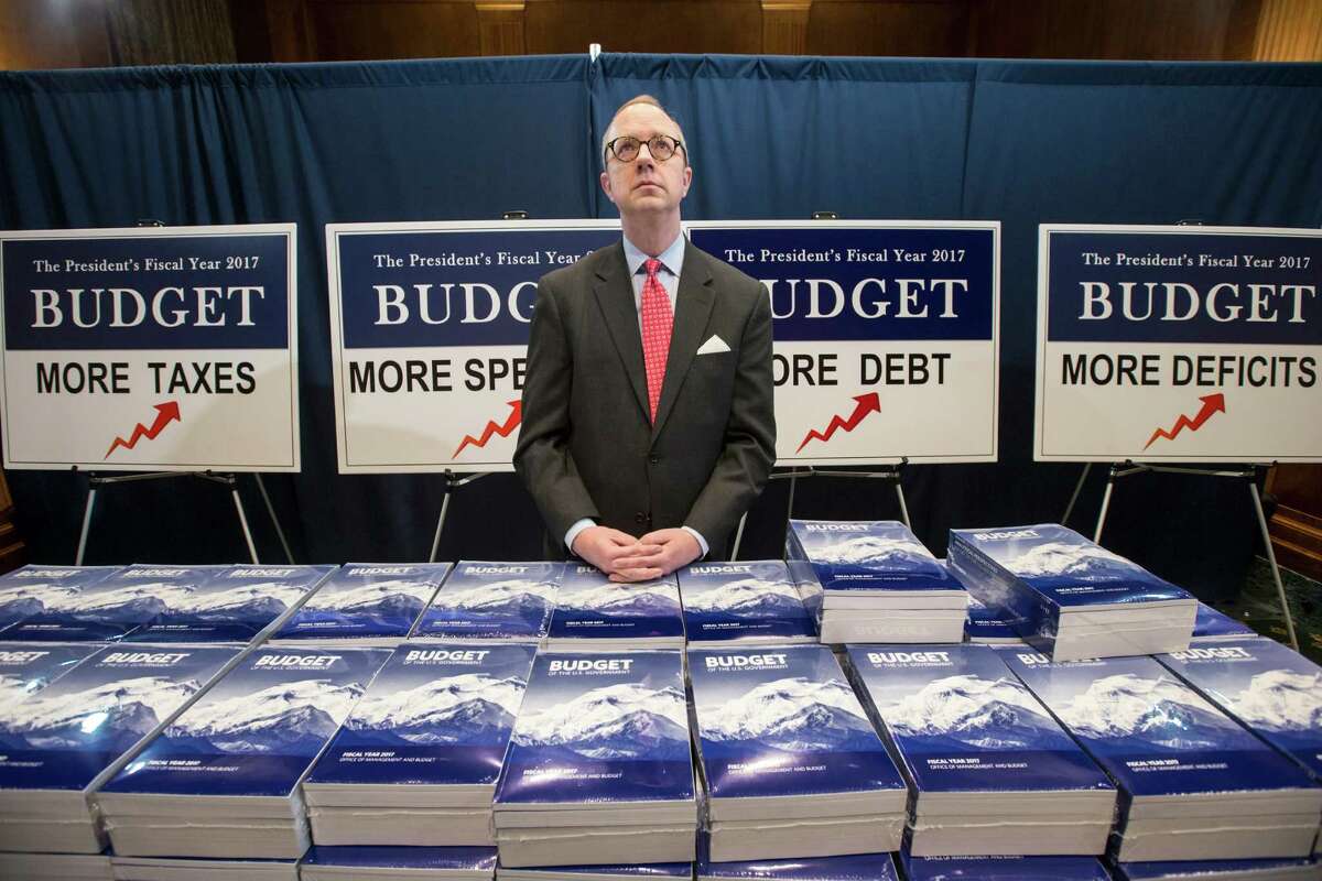 Copies of President Barack Obama’s fiscal 2017 federal budget are staged for display by Eric Euland, Republican staff director for Senate Budget Committee Chairman Sen. Mike Enzi, R-Wyo., on Tuesday.
