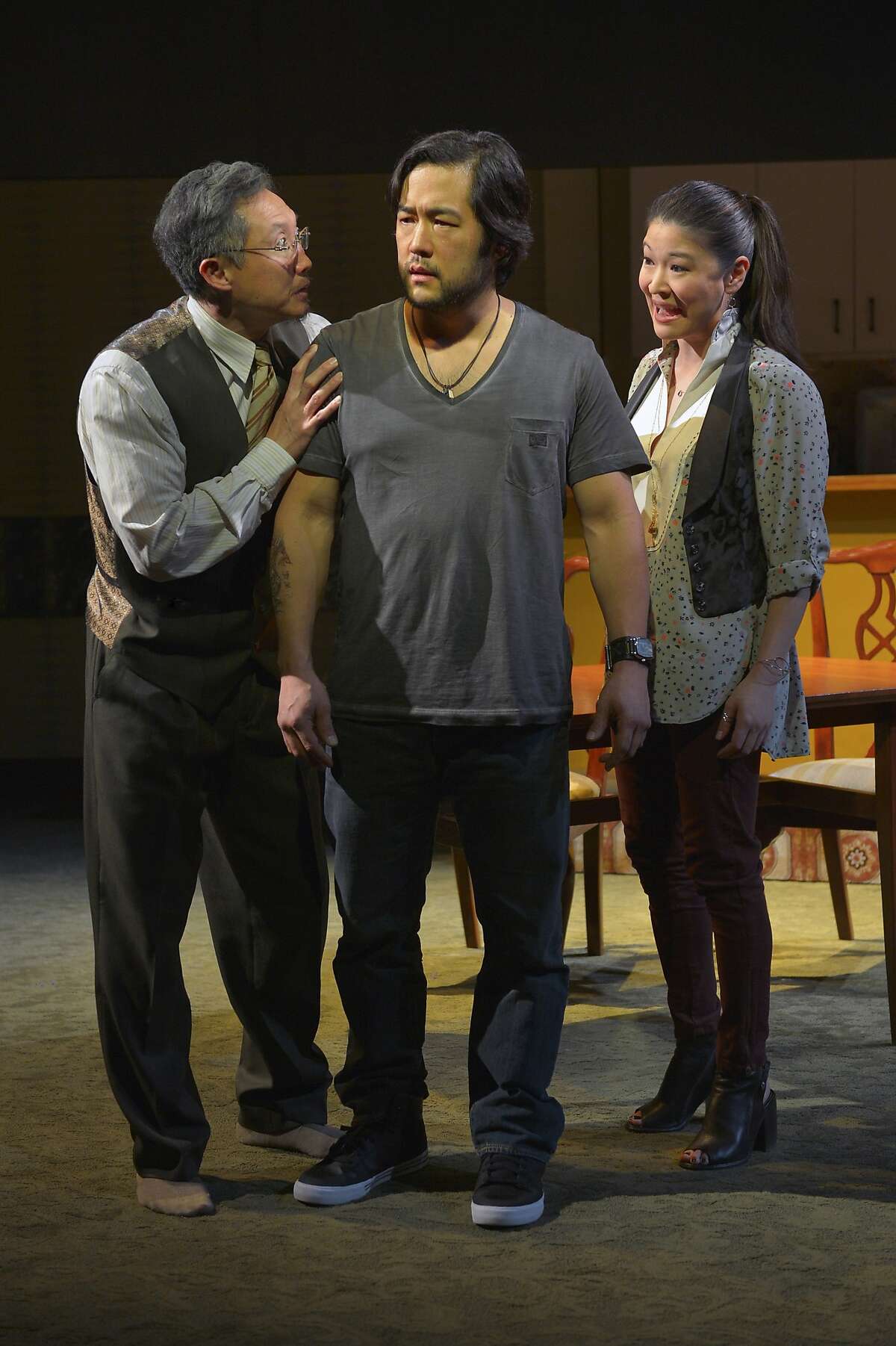Ray (Tim Kang, center) gets together with his Uncle (Joseph Steven Yang) and Cornelia (Jennifer Lim) in Julia Cho's "Aubergine" at Berkeley Repertory Theatre