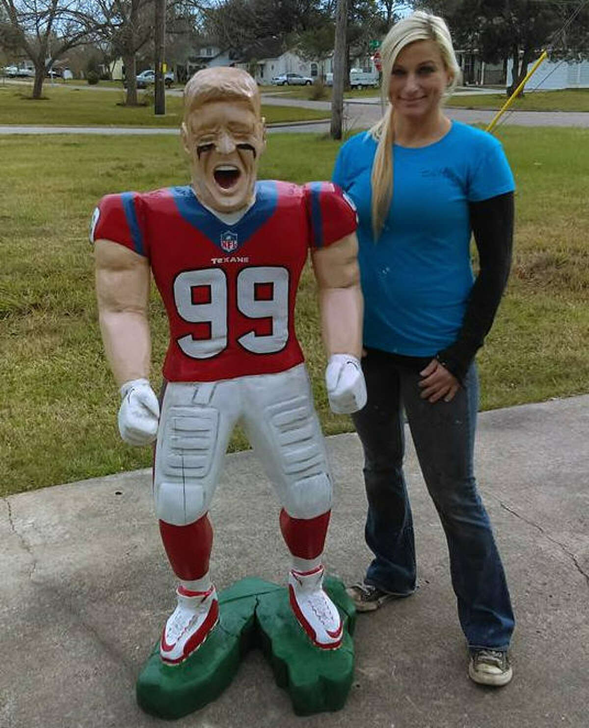 Della Meredith with the five-foot J.J. Watt statue she carved.