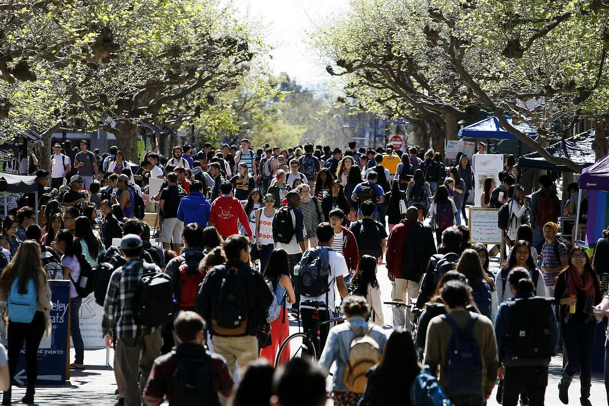 A mix of students walk through Sproul Plaza between classes on the Cal campus in Berkeley, CA, Tuesday, March 11, 2014. State legislature is considering restoring the ability of California universities to use race and ethnicity in admissions decisions.