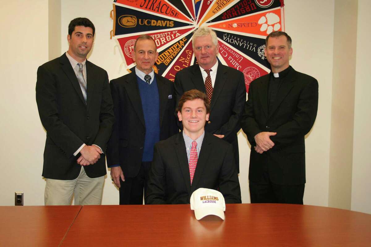 Pictured with Brendan Hoffman from left: Athletic Director Tom Curran, Principal Dr. Robert Perrotta, Varsity Lacrosse Coach Chris Smalkais, Pres. Rev. Tom Simisky, S.J.
