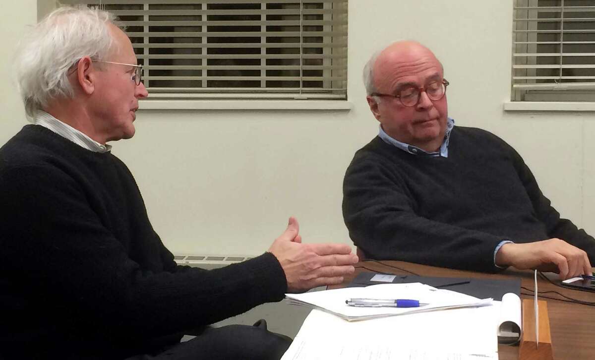 Historic District Commission Chairman Francis Henkels, left, and member Ed Gerber discuss a proposal to designate the Saugatuck swing bridge and nearby area as a National Historic Register District.