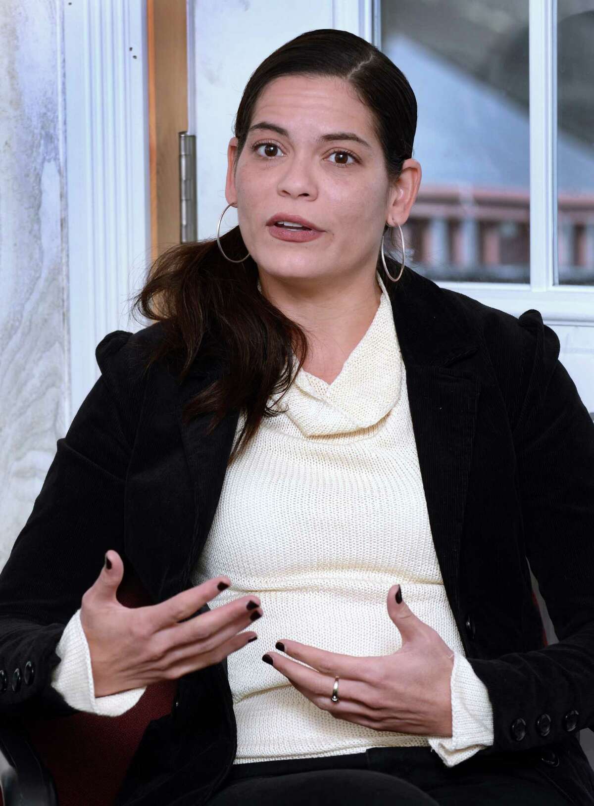 Ingrid Alvarez-DiMarzo, state director of the Hispanic Federation, joined other advocates on Wednesday in supporting legislation that would end the practice of including prison populations as residents of those largely rural and suburban districts, taking away political power from the large cities where most lived before prison.