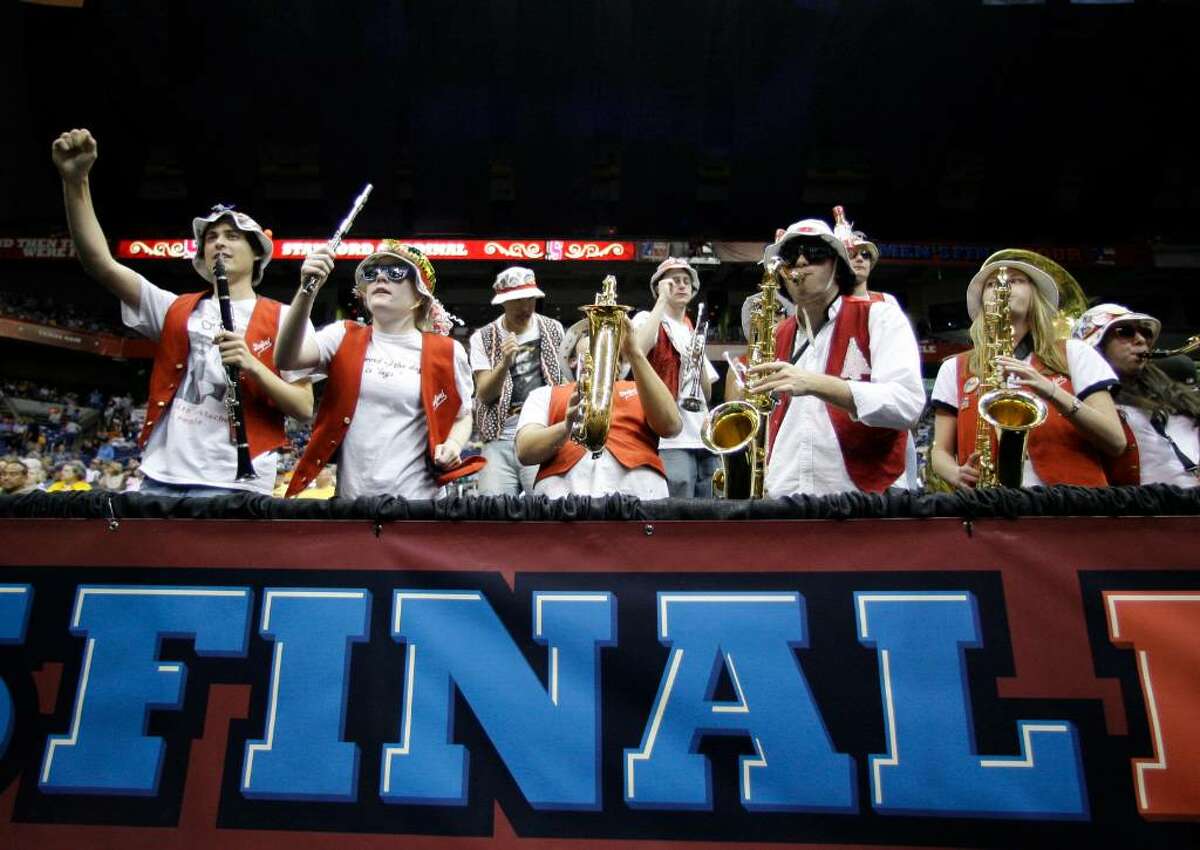 Stanford band members cheer at the start of the women's NCAA Final Four college basketball championship game against Connecticut Tuesday, April 6, 2010, in San Antonio. (AP Photo/Eric Gay)