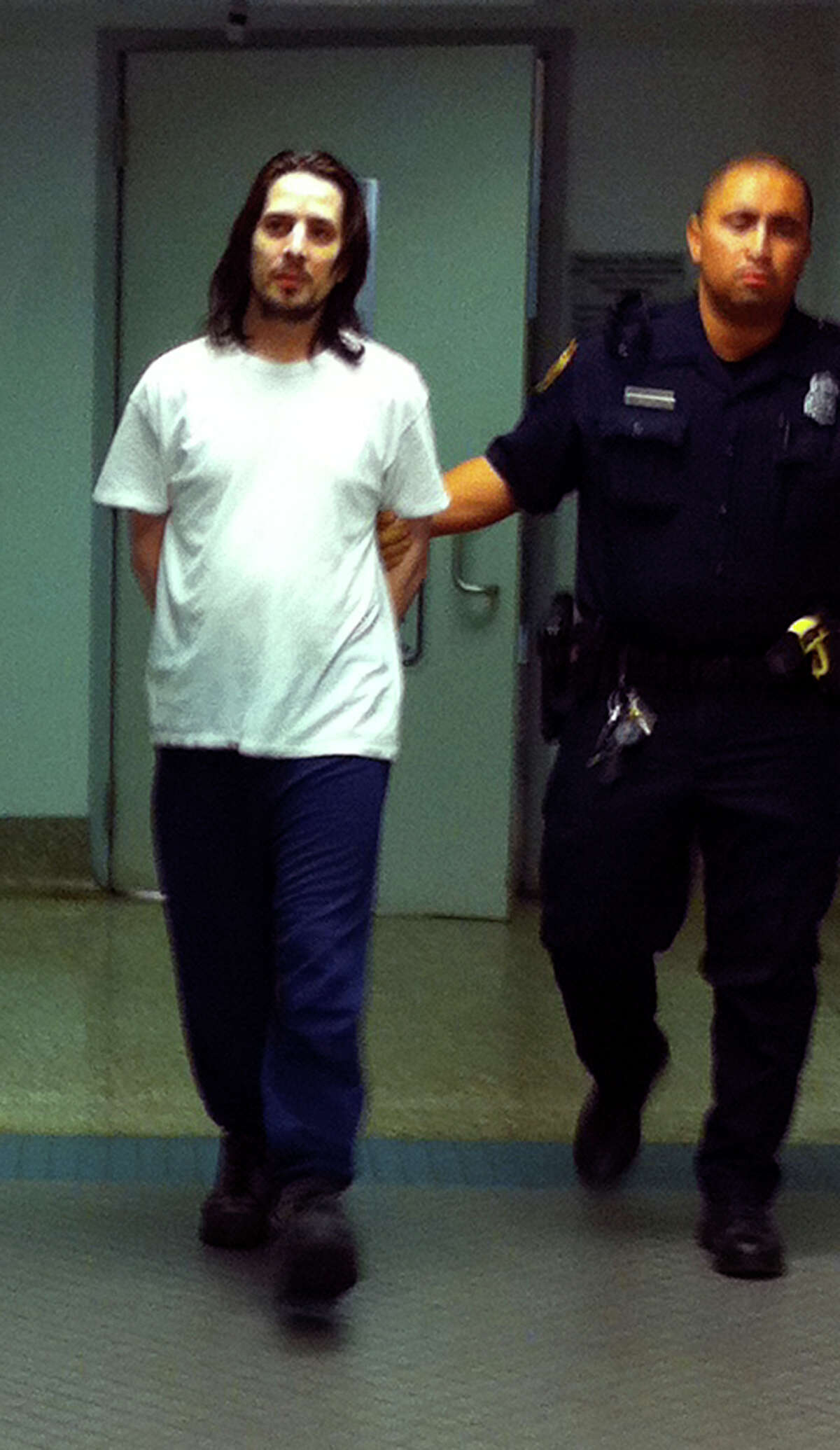 Baron Ochoa after his initial arrest, charged with two counts of continuous sexual abuse of a child. He later was charged with capital murder, but that charge was dismissed under a plea deal and he was sentenced to 55 years in prison.
