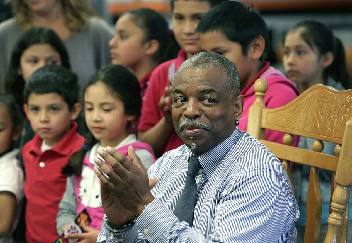 LeVar Burton, host of "Reading Rainbow" and actor in "Roots" and "Star Trek", applauds the students at Bowden Elementary School for being committed to reading. Burton read his children's book "The Rhino Who Swallowed A Storm" to students at Bowden Elementary School on Thursday, Feb. 11, 2016.