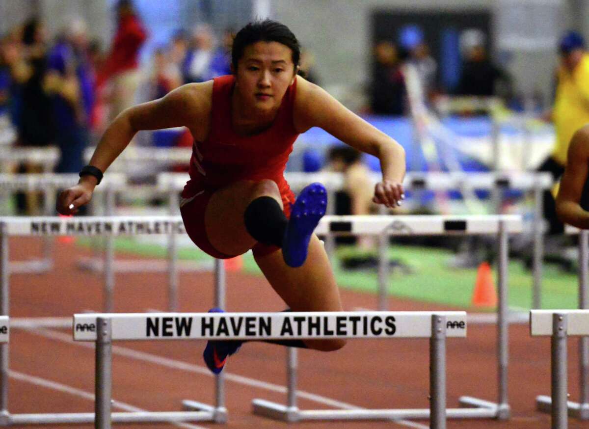 Greenwich's Emily Wu competes in the 55 meter hurdles during CIAC Class LL Indoor Track and Field Championships in New Haven, Conn. on Thursday Feb. 11, 2016.