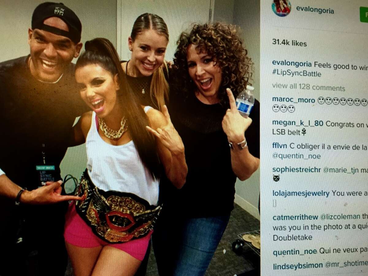 Eva poses with her flashy 'Lip Sync Battle' belt and cast of 'Telenovela' for this Instagram shot.