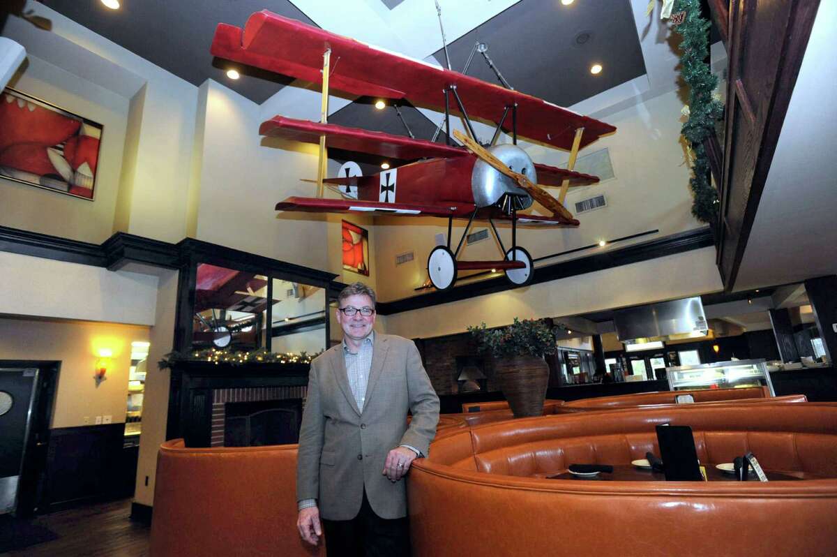 Ray Harper of Woodbury, the founder of Maggie McFly's, at the Southbury, Conn., restaurant location. 