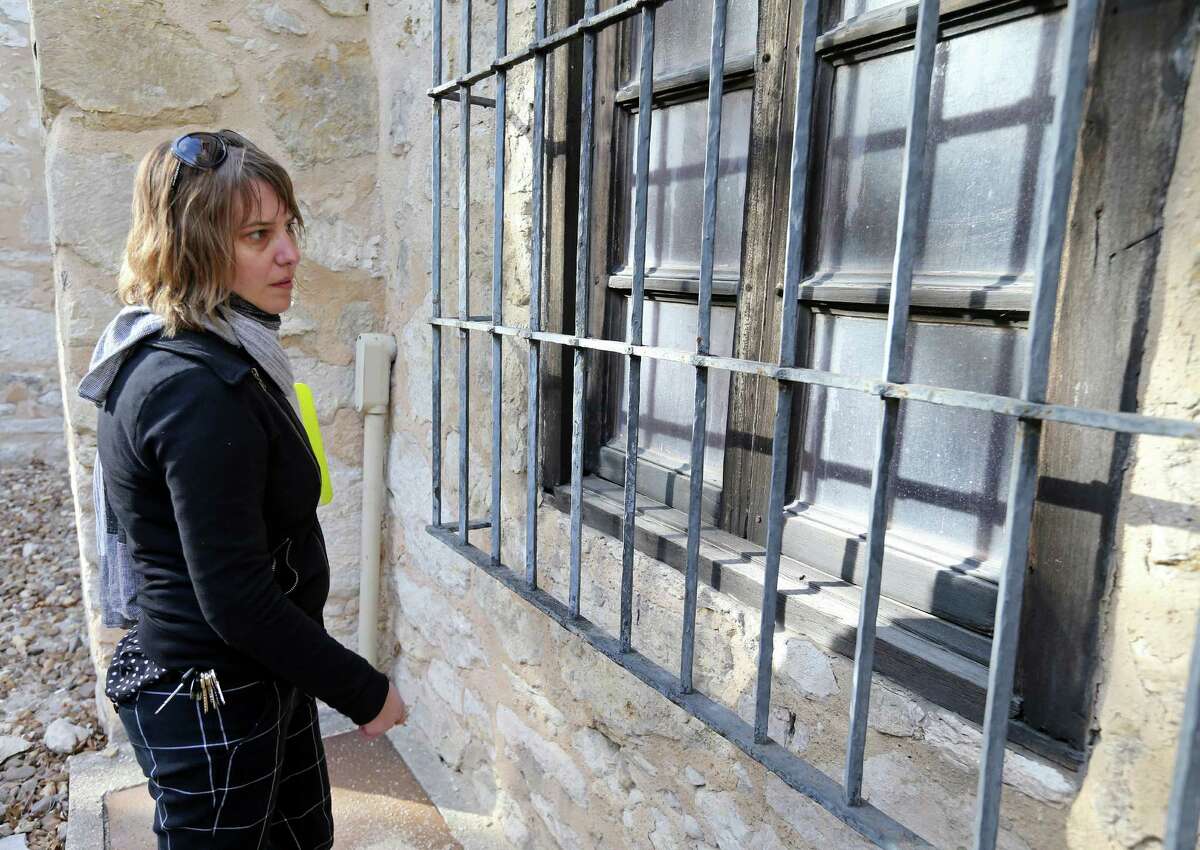 2. Windows of the Alamo Church and long barrack will be repaired or replaced. Kim Barker, construction project manager at the Alamo, shows a window section to be repaired in the Alamo complex Monday Feb. 8, 2016.