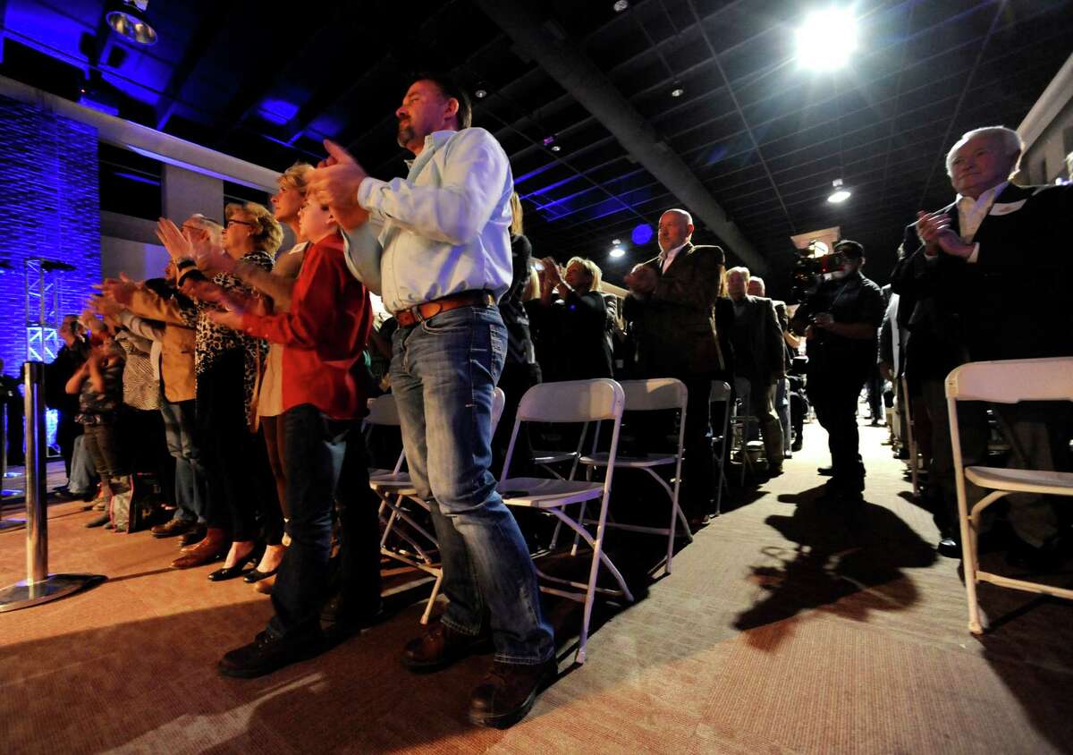 Ronald W. Erdrich/Reporter-News Audience members applaud U.S. Senator and Republican presidential candidate Ted Cruz during a rally Tuesday night, Dec. 29, 2015 in Cisco. The "Reigniting the Promise Community Rally" was sponsored by the Keep the Promise Super PAC and held at the Myrtle Wilks Community Center. At the edge of the third row stands Farris Wilks, whose mother the building is named after.