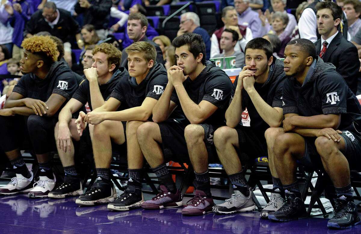 The Texas A&M bench watches the closing moments of the second half of an NCAA college basketball game against LSU in Baton Rouge, La., Saturday, Feb. 13, 2016. LSU won 76-71. (AP Photo/Bill Feig)