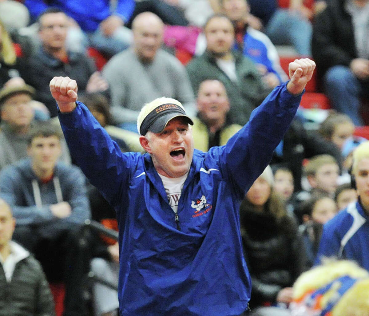 Danbury wrestling coach Ricky Shook reacts during the FCIAC wrestling championships at New Canaan High School, Conn., Saturday, Feb. 13, 2016.