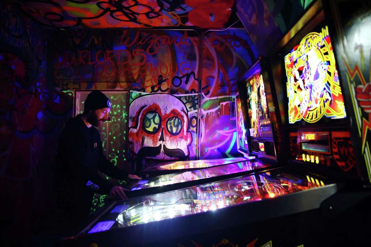 Travis Maisch plays in the semifinal round of the IFPA Washington State Pinball Championships, Saturday, Feb. 13, 2016 at 8-Bit Arcade in Renton. Sixteen of the state's best players competed for the title and a trip to Las Vegas for the national championships.
