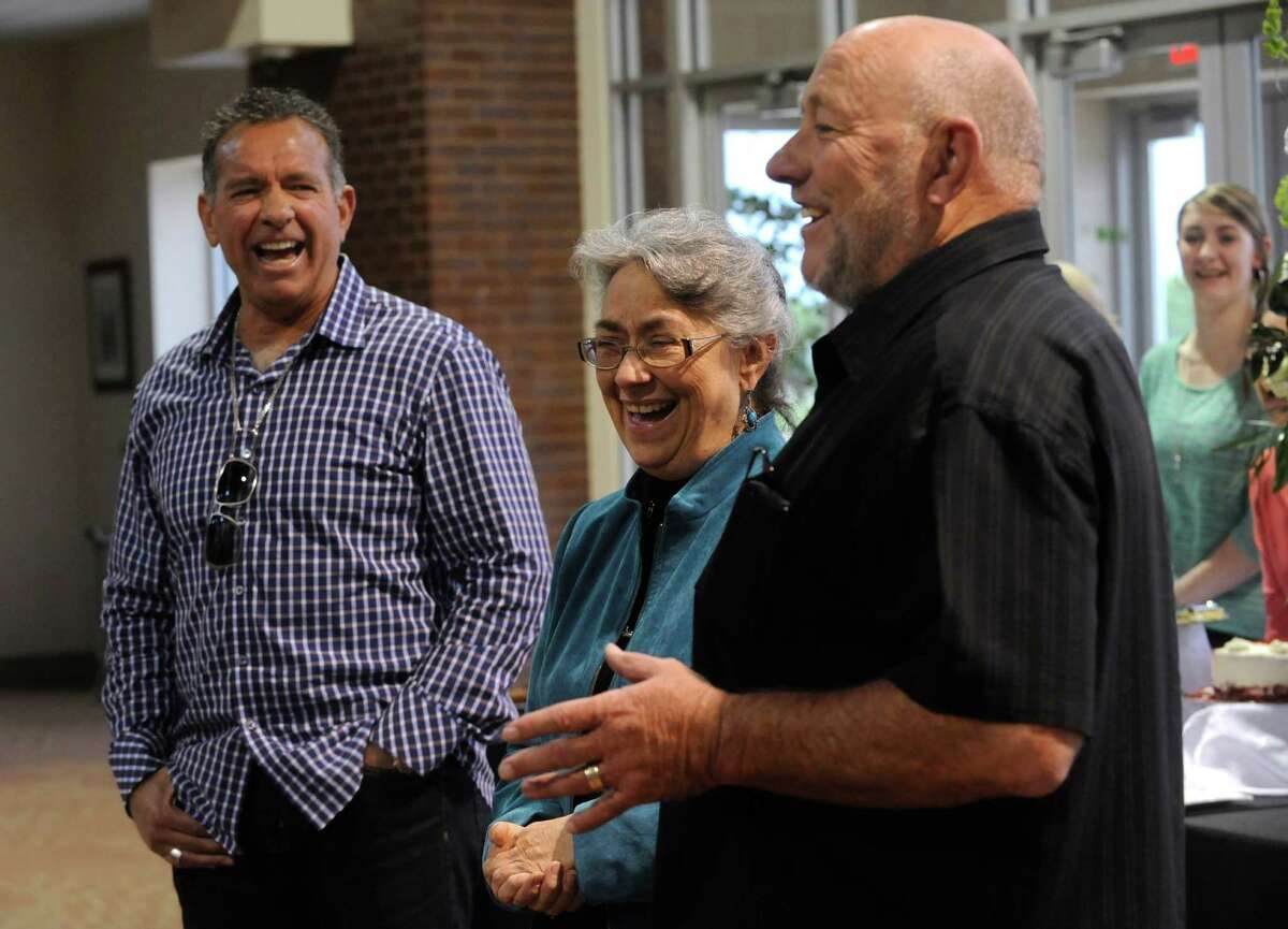 Farris Wilks, right, and his brother, Dan, laugh with their sister Beth Maynard in 2013. In the run-up to the 2016 elections, the Wilks family seems primed to exceed their $1.2 million in donations in Texas' last cycle, $700,000 of which went to Attorney General Ken Paxton's campaign. ﻿