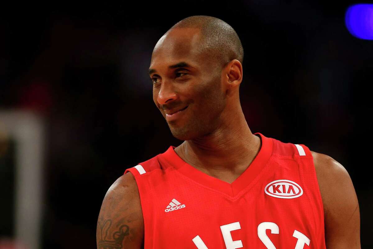 Guard Kobe Bryant of the Los Angeles Lakers stands with center News  Photo - Getty Images