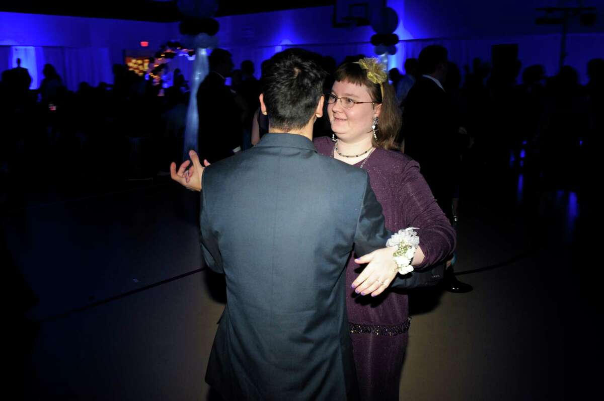 Ivailo Agli and Hayley Leonard, of South Kent, dance during the Faith Church "Night to Shine Prom" for people with special needs on Friday night, February 12, 2016, in New Milford, Conn.
