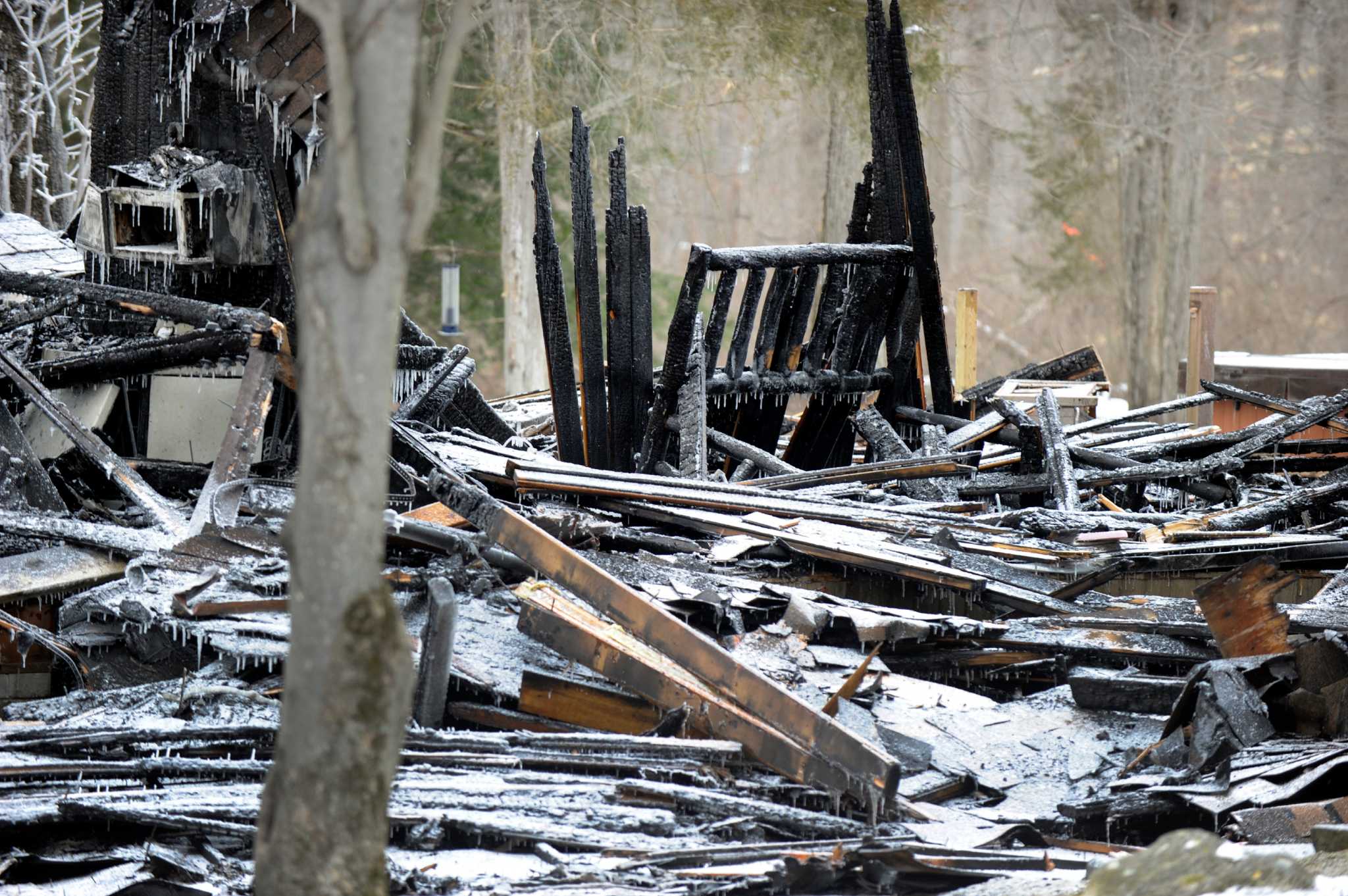 Sherman home that caught fire 'a total loss', image size:2048x1362
