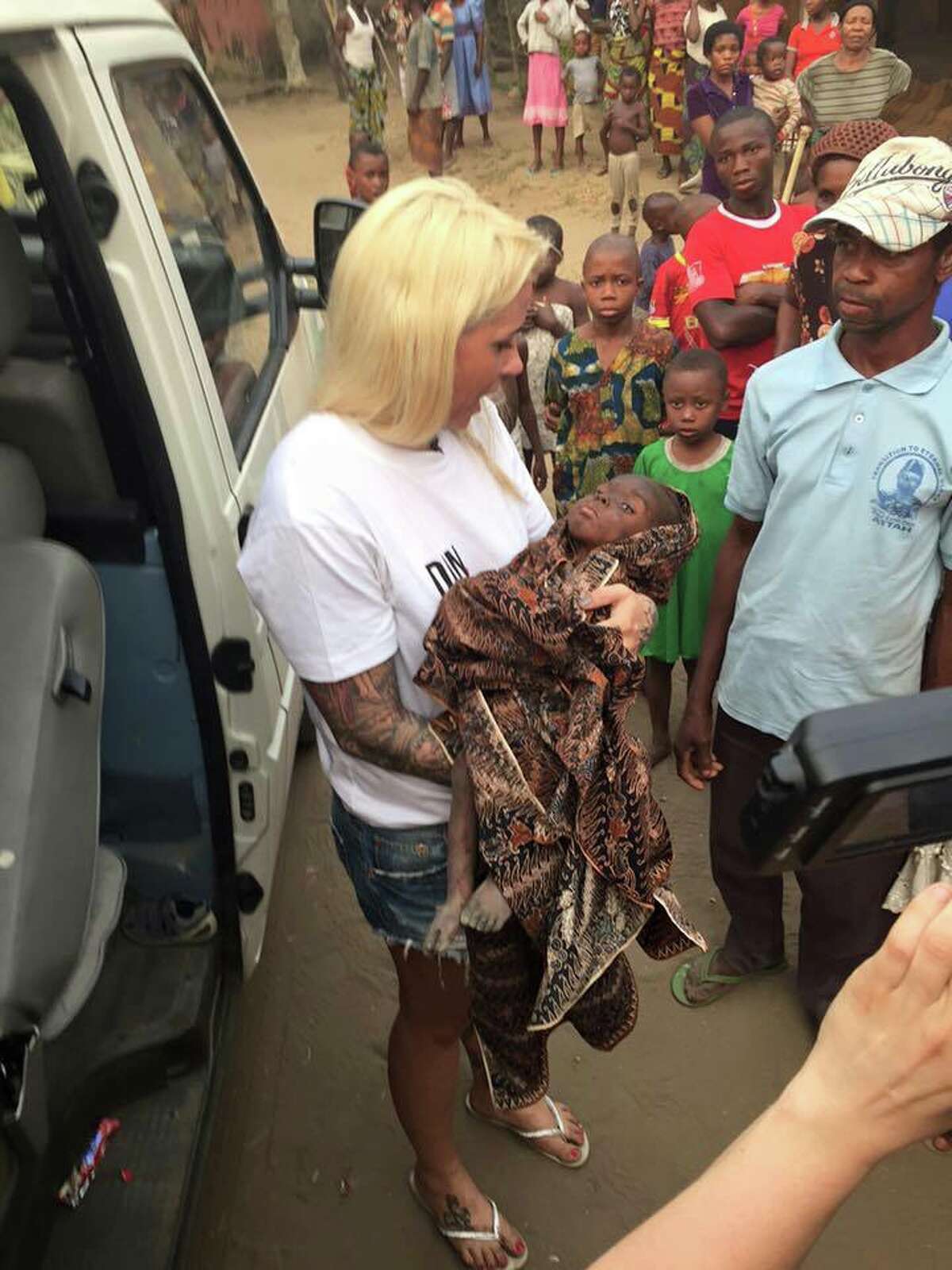 Anja Ringgren Lovén, the Danish founder of the African Children's Aid Education and Development Foundation, rescues a starving Nigerian child after he was labeled a witch by his community and abandoned by his parents. Warning: The following images are distressing. 