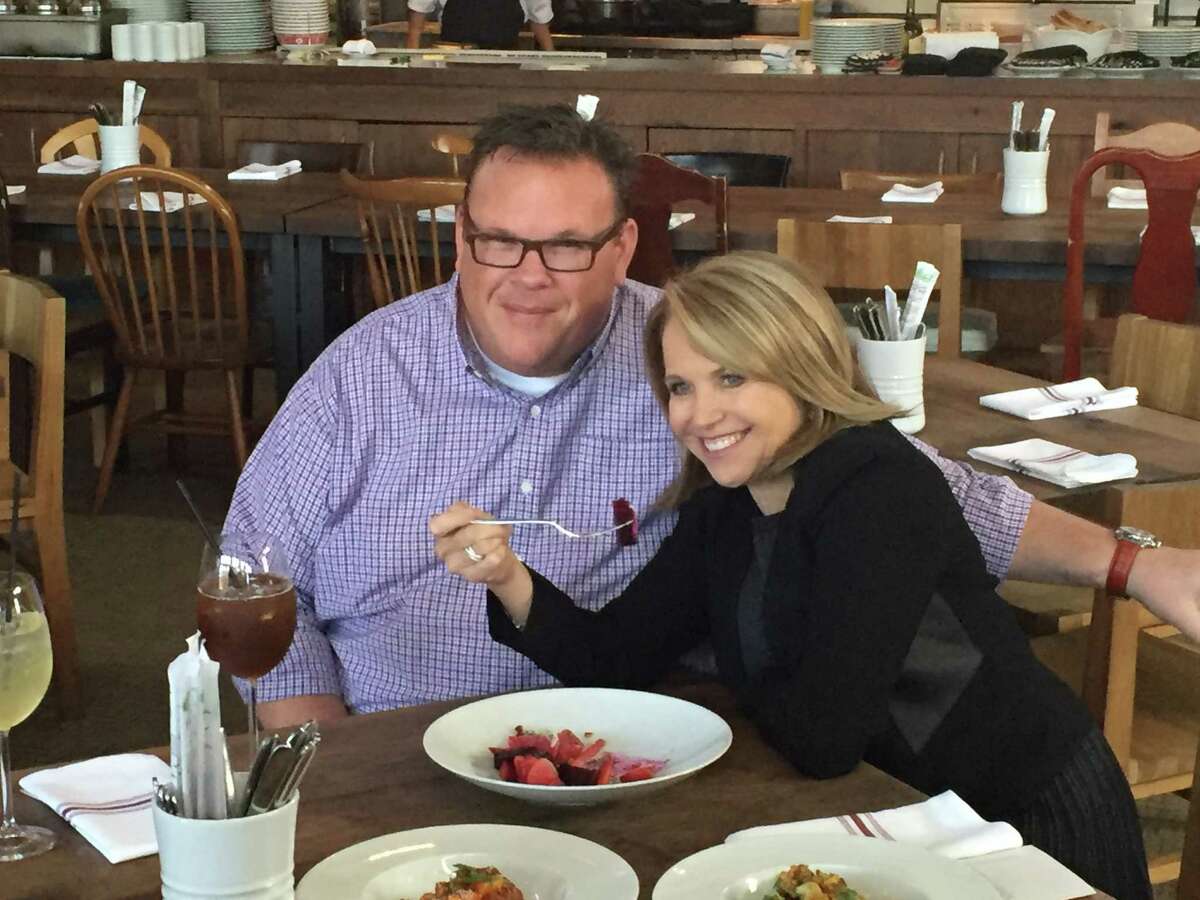 Katie Couric, global news anchor for Yahoo, visits with Underbelly chef Chris Shepherd. Couric, who was in Houston on assignment, dined at the Montrose restaurant on Thursday, Feb. 11. She sampled the Korean braised goat and dumplings, crispy cauliflower in caramelized fish sauce and the roasted beet salad.